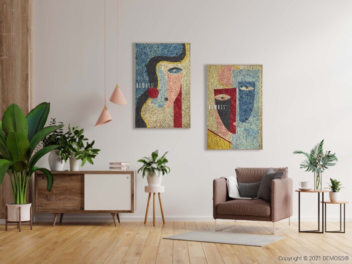 Un salon moderne avec deux œuvres d'art abstraites au mur, un fauteuil marron, une petite table d'appoint avec une plante, une armoire en bois avec des plantes en pot et deux suspensions suspendues. La pièce dégage une atmosphère lumineuse et aérée avec du parquet et des murs blancs accentués par Abstract Ermida.